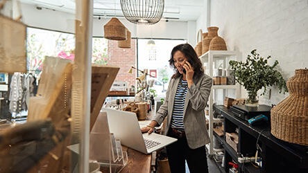 woman shop commerce laptop