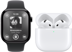 Apple Watch Series 11, titanium slate case, band: black sport band, Apple Music app open, paired with AirPods 4