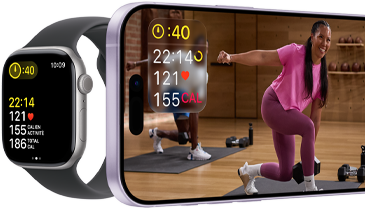 Apple Watch à côté d’un iPhone affichant une séance Apple Fitness+