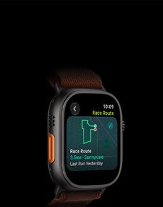 Apple Watch Ultra 4, titanium case, black colour, Race Route feature with a map of a running route, left side exterior, Action button, Alpine Loop band, burgundy colour