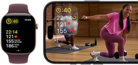 Apple Watch à côté d’un iPhone affichant une séance Apple Fitness+
