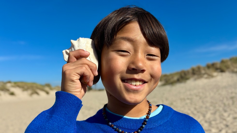 Photo taken with 48MP Fusion camera, next-generation portraits feature in use, focused on a person's face