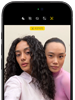 iPhone 18 Pro, black, front exterior, displaying two models posing for the camera, demonstrating the Center Stage front camera