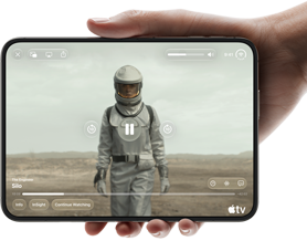 iPhone Duo, held with one hand, opened in horizontal orientation, fully unfolded, interior screen displays Apple TV show "Silo"
